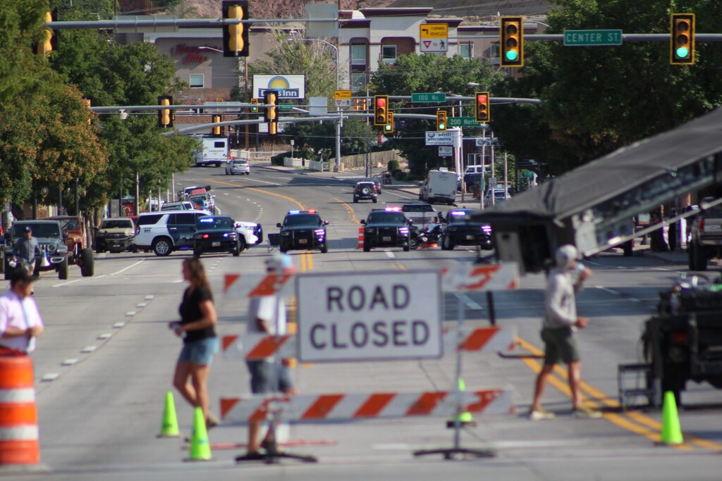 (Doug McMurdo | The Times-Independent) Moab Police officers ride three abreast on Highway 191 during the filming of a movie on Wednesday, July 30.