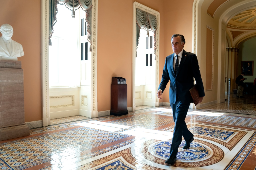 (Stefani Reynolds | The New York Times) Sen. Mitt Romney, R-Utah, walks through the Capitol in Washington on Wednesday, May 19, 2021.