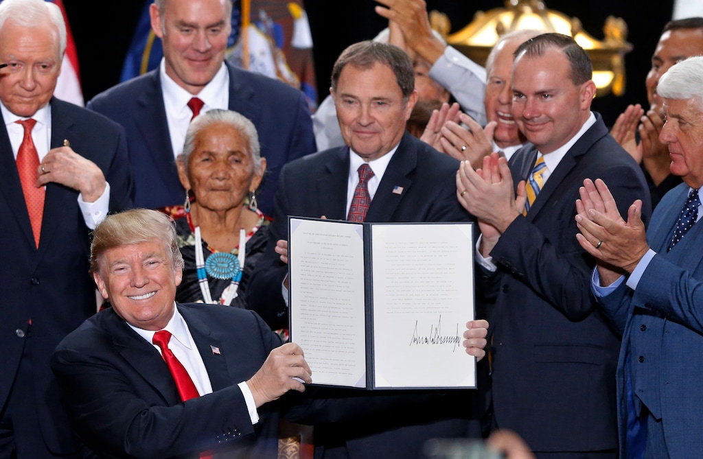(AP Photo/Rick Bowmer)

Donald Trump holds up a signed proclamation to shrink the size of Bears Ears and Grand Staircase Escalante national monuments at the Utah State Capitol, Dec. 4, 2017, in Salt Lake City.