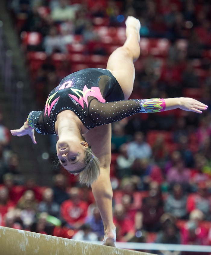 (Rick Egan  |  The Salt Lake Tribune)   Maddy Stover competes on the beam for Utah, in Gymnastics action Utah vs. Oregon State at the Jon M. Huntsman Center, Friday, January 19, 2018.