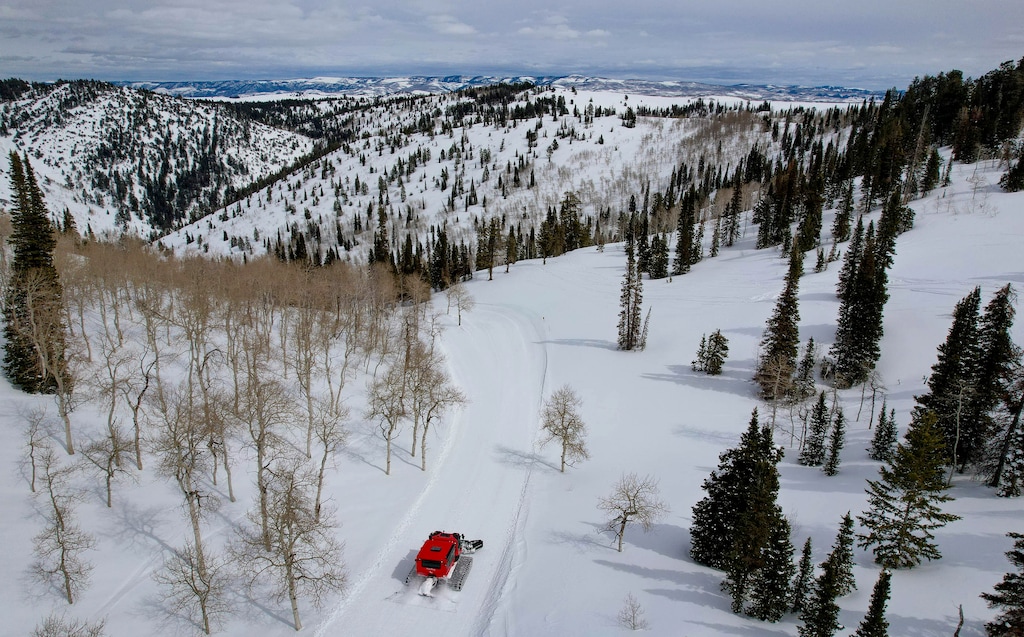 (Francisco Kjolseth  | The Salt Lake Tribune) The adventure snow cat heads out to pick up a private tour in the Davenport area on the private side of Powder Mountain on Friday, March 21, 2025. The Powder Mountain ski area wraps up its first season under Netflix cofounder Reed Hastings's experiment of taking some lifts private while leaving other public.