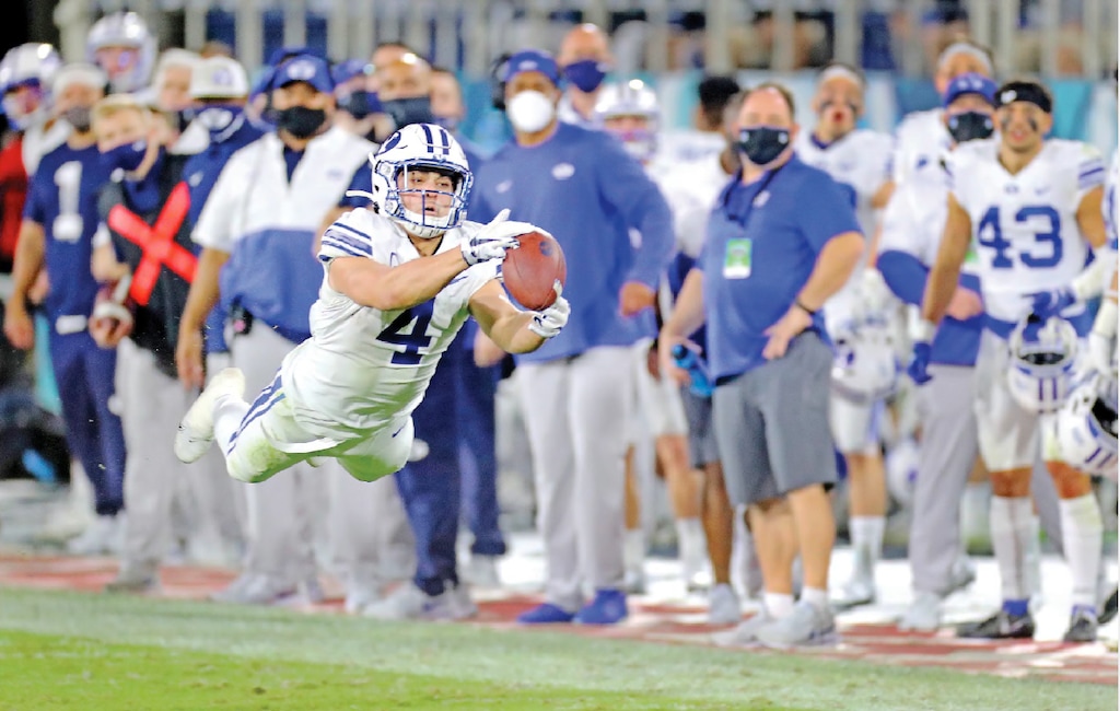 BYU's Lopini Katoa stretches out for a catch late in the second quarter against Central Florida in the Boca Raton Bowl NCAA college football game Tuesday, Dec. 22, 2020, in Boca Raton, Fla. (Mike Stocker/South Florida Sun-Sentinel via AP)