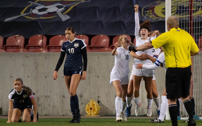 (Francisco Kjolseth  |  The Salt Lake Tribune) Emma Neff #9 of Olympus celebrates her game winning header in overtime over Bonneville during their 5A high school girls championship game at Rio Tinto Stadium in Sandy on Friday, Oct. 23, 2020. Bonneville won 1-0 in overtime.