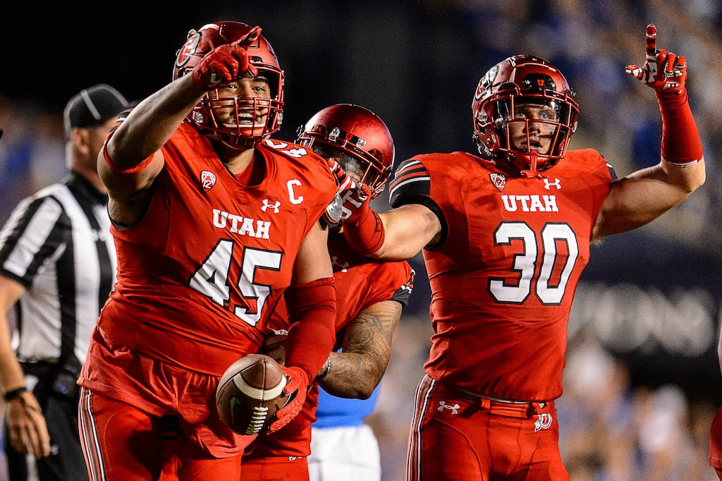 (Trent Nelson | The Salt Lake Tribune) Utah Utes defensive tackle Filipo Mokofisi (45) celebrates a turnover as BYU hosts Utah, NCAA football in Provo, Saturday, Sept. 9, 2017.