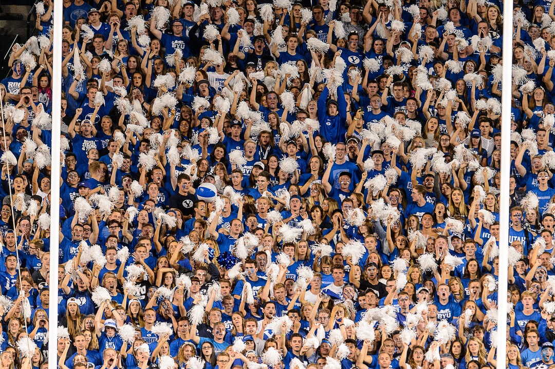 (Trent Nelson | The Salt Lake Tribune)  BYU fans cheer as BYU hosts Utah, NCAA football in Provo, Saturday September 9, 2017.