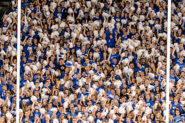 (Trent Nelson | The Salt Lake Tribune)  BYU fans cheer as BYU hosts Utah, NCAA football in Provo, Saturday September 9, 2017.