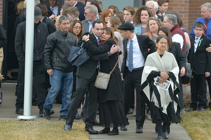 (Francisco Kjolseth  |  The Salt Lake Tribune) Danny Haynie is embraced following funeral services for his mother and siblings Consuelo Alejandra Haynie and her children Milan, 12, Alexis, 15 and Matthews, 14, in Grantsville on Friday, Jan. 24, 2020. The killing of the Utah mother and three of her children by a gunman identified by police as her 16-year-old son is "nearly unbearable" for the father who survived, a lawyer said Thursday, Jan. 23, 2020.