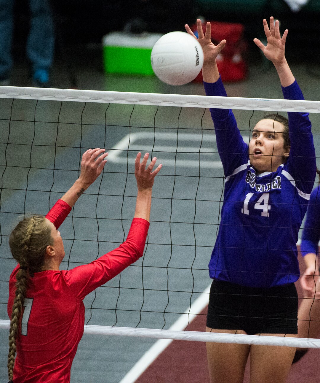 (Rick Egan  |  The Salt Lake Tribune)  past Bountiful Braves Baylee Mittelstaedt (1) hits the ball as Box Elder Bees Annie Mecham (14) defends, in 5A volleyball championship game, Bountiful vs. Box Elder, at Utah Valley University, Saturday, November 4, 2017.