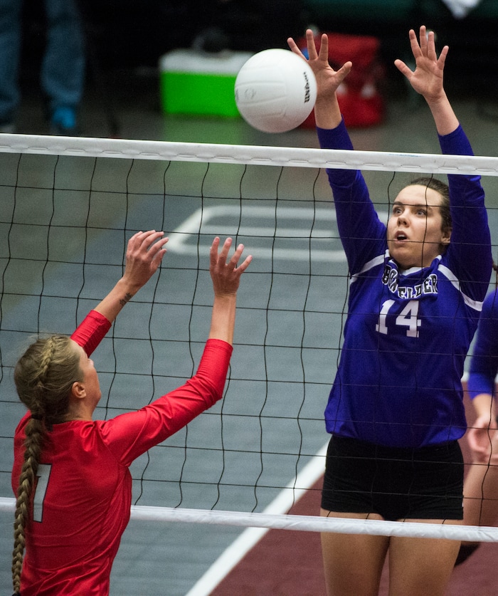 (Rick Egan  |  The Salt Lake Tribune)  past Bountiful Braves Baylee Mittelstaedt (1) hits the ball as Box Elder Bees Annie Mecham (14) defends, in 5A volleyball championship game, Bountiful vs. Box Elder, at Utah Valley University, Saturday, November 4, 2017.