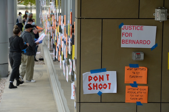(Francisco Kjolseth  |  The Salt Lake Tribune) Demonstrators gather at the Salt Lake County District Attorney's office as they plaster the building asking for Justice for Bernardo Palacios Rally, on Thursday, June 18, 2020.