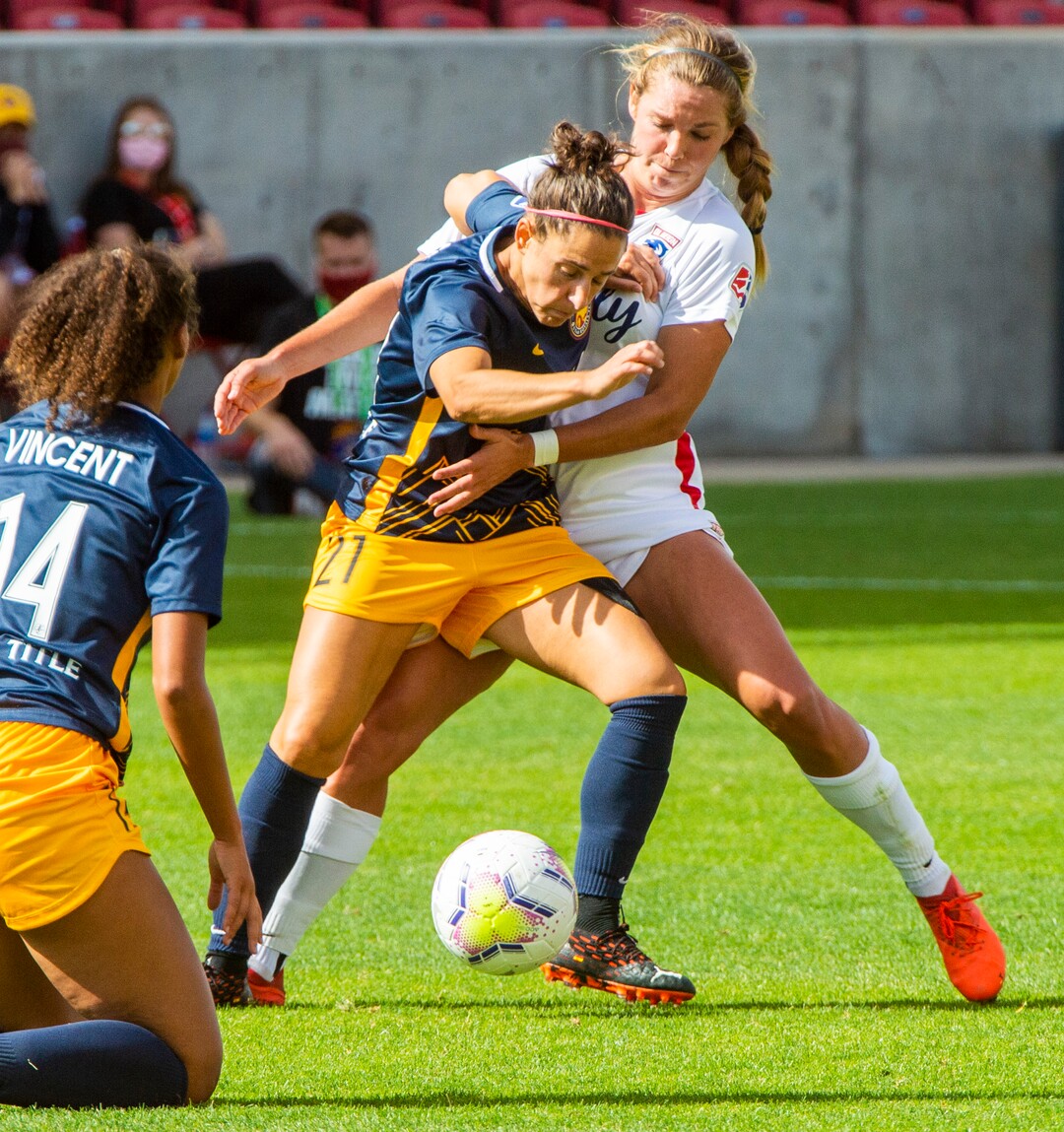 (Rick Egan  |  The Salt Lake Tribune)  Utah Royals FC midfielder Vernica Boquete (21) goes for the ball as OL Reign FC midfielder Danielle Weatherholt (17) defends, in soccer action between Utah Royals FC and Ol Reign FC at Rio Tinto Stadium in Sandy, Saturday, Sept. 26, 2020.