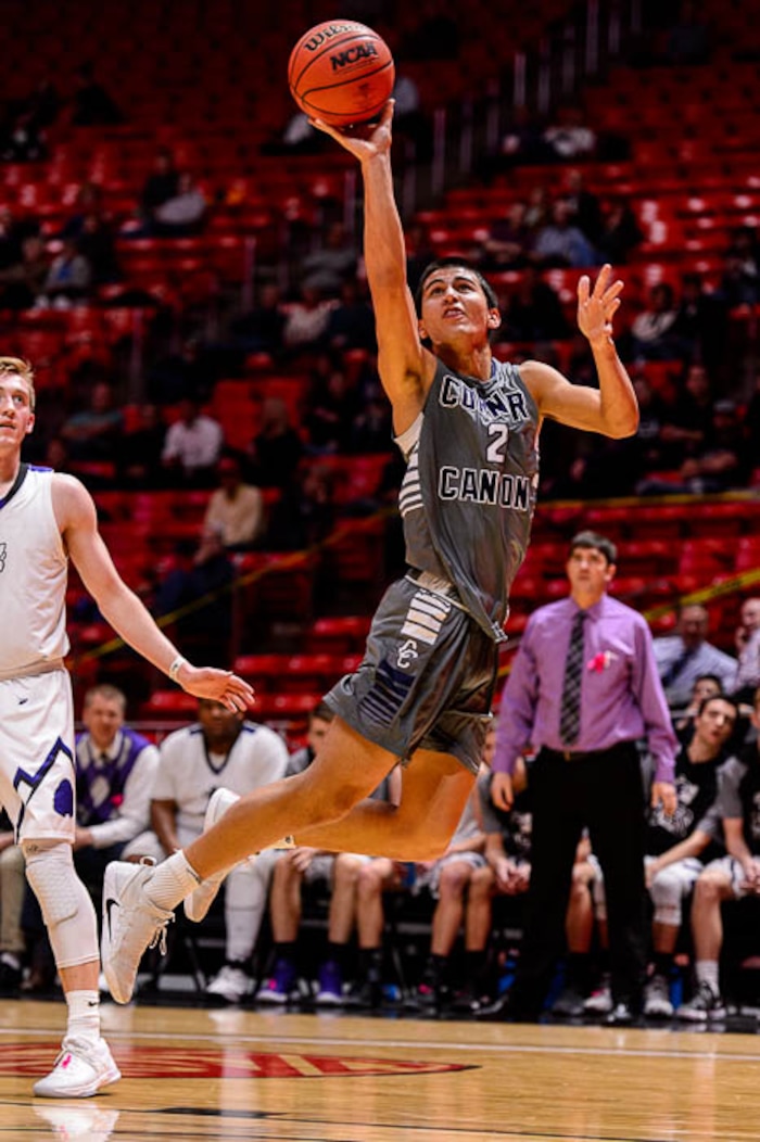 (Trent Nelson | The Salt Lake Tribune)  Box Elder vs. Corner Canyon, 5A State high school basketball tournament at the Huntsman Center in Salt Lake City, Wednesday Feb. 28, 2018. Corner Canyon's John Mitchell (2) shoots.