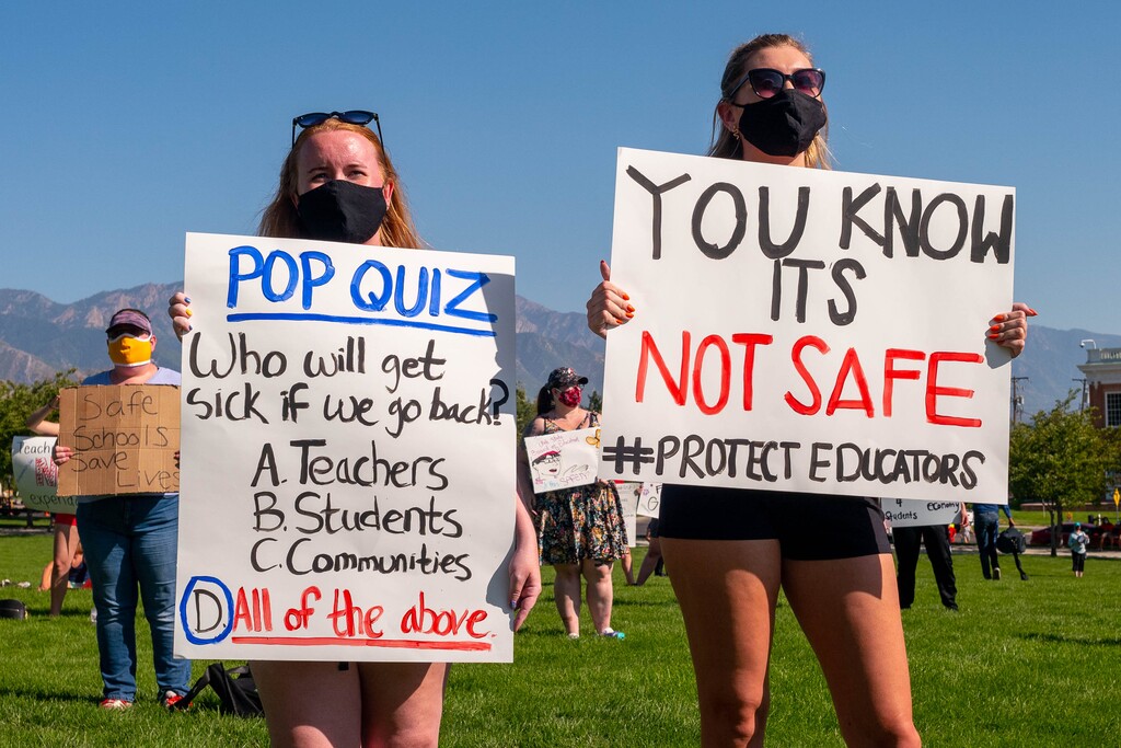 (Trent Nelson  |  Tribune file photo) Teachers and their supporters gather at the State Capitol in Salt Lake City in support of school safety in reopening plans, on Friday, Aug. 7, 2020. From left are Katie Barney and Emerald Barney.