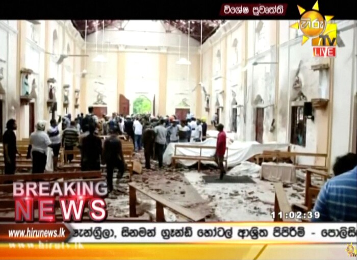 ADDS DETAIL OF THE PLACE - This image made from video provided by Hiru TV shows damage inside St. Anthony's Shrine after a blast in Colombo, Sunday, April 21, 2019. Near simultaneous blasts rocked three churches and three hotels in Sri Lanka on Easter Sunday. (Hiru TV via AP)