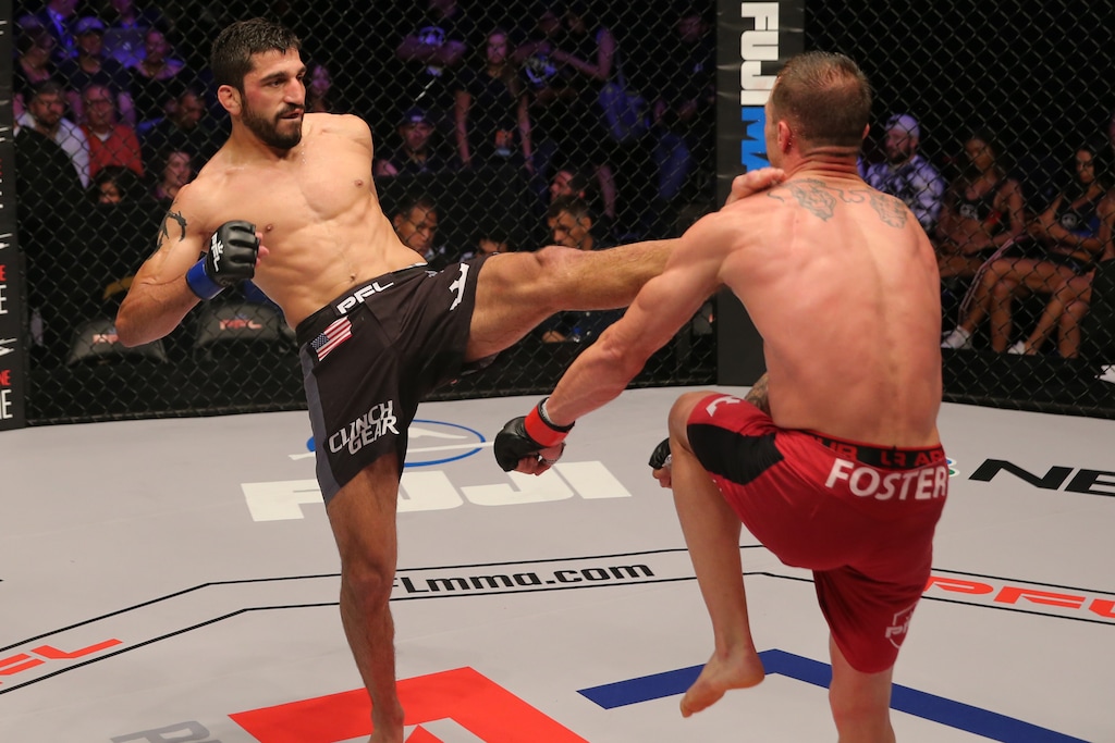 (Photo courtesy of Professional Fighters League) Former UVU wrestler turned pro MMA fighter Ramsey Nijem (left), shown here during a PFL fight in Chicago in July 2018, is back for another season in the PFL. Nijem, who lives full-time in Salt Lake City, also runs an MMA gym called The Pit SLC.