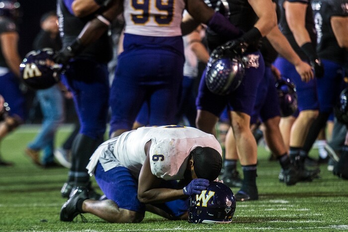 (Chris Detrick  |  The Salt Lake Tribune)  Western Illinois Leathernecks defensive back Xavier Rowe (6) remains on the ground after the game at Stewart Stadium Saturday, November 25, 2017.  Weber State Wildcats defeated Western Illinois Leathernecks 21-19.