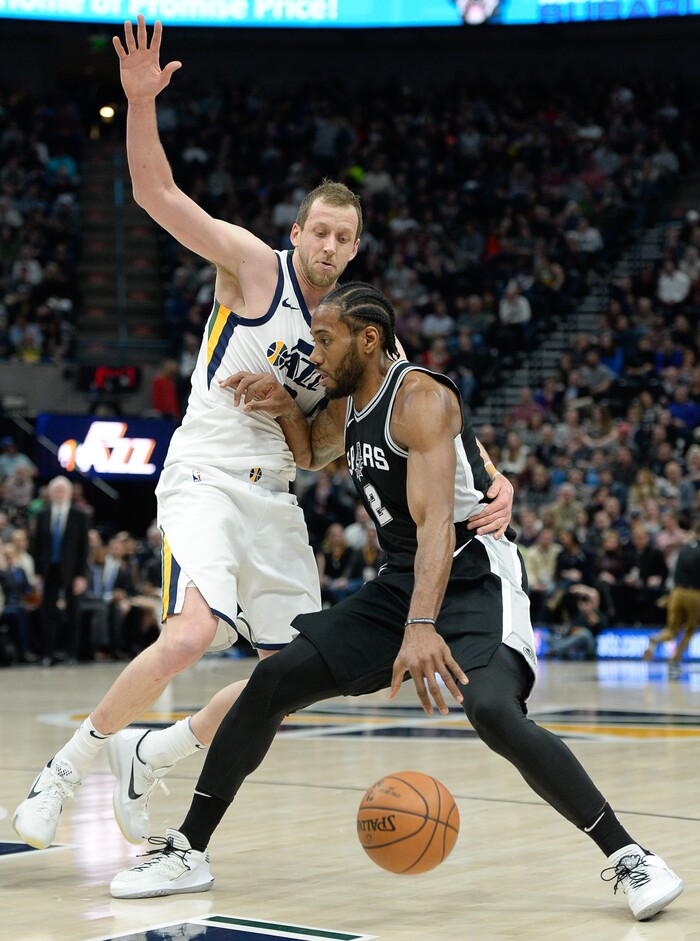 (Francisco Kjolseth  |  The Salt Lake Tribune)  Utah Jazz forward Joe Ingles (2) puts the pressure on San Antonio Spurs forward Kawhi Leonard (2) during the first quarter of an NBA basketball game in Salt Lake City, Thursday, Dec. 21, 2017.