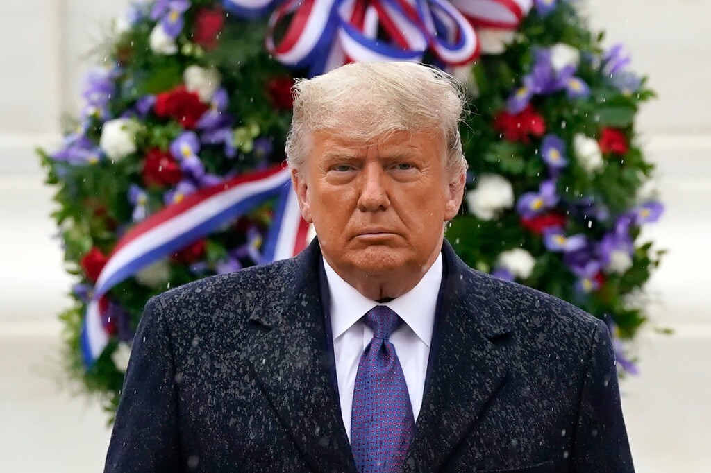 (Patrick Semansky | AP file photo)  President Donald Trump participates in a Veterans Day wreath laying ceremony at the Tomb of the Unknown Soldier at Arlington National Cemetery in Arlington, Va., Wednesday, Nov. 11, 2020.