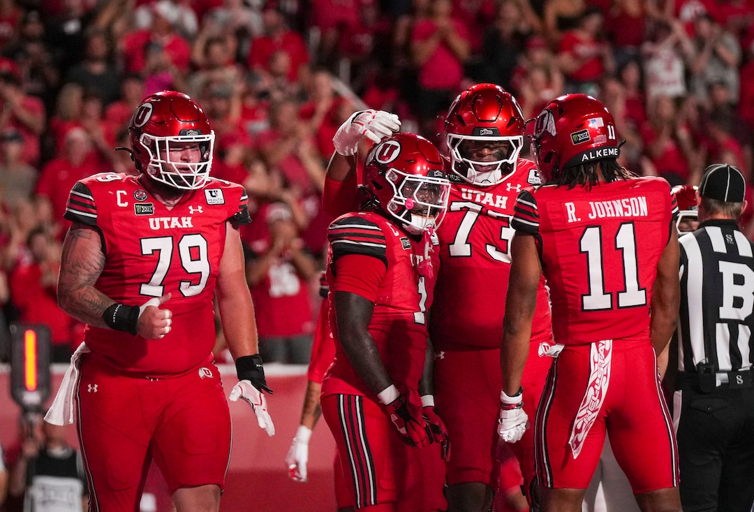 (Bethany Baker  |  The Salt Lake Tribune) Utah Utes celebrate a touchdown during the game between the Utah Utes and the Arkansas Razorbacks in Salt Lake City on Saturday, Sept. 12, 2026.
