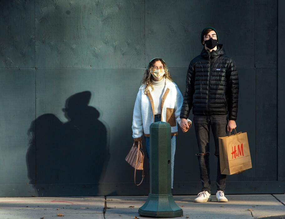 (Rick Egan | The Salt Lake Tribune)  Jazzy and Boston McClary wear masks as they shop in downtown Salt Lake City on Nov. 12.