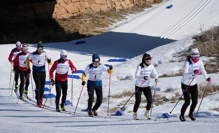 (Francisco Kjolseth | The Salt Lake Tribune) Skiers warm up before competition in the men’s and women’s classic during the NCAA Skiing Championships held at the Soldier Hollow Nordic Center on Thursday, March 10, 2022 in Midway, Utah. 