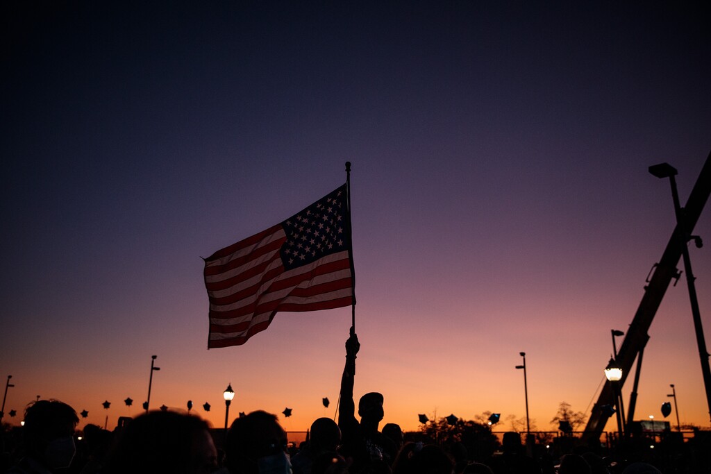 (Damon Winter| The New York Times)
A supporter of President-elect Joe Biden supporters raises the flag at a rally in Wilmington, De., Saturday Oct. 7, 2020. "People who do not share truths can’t defeat a pandemic, can’t defend the Constitution and can’t turn the page after a bad leader. The war for truth is now the war to preserve our democracy," Thomas Friedman writes.