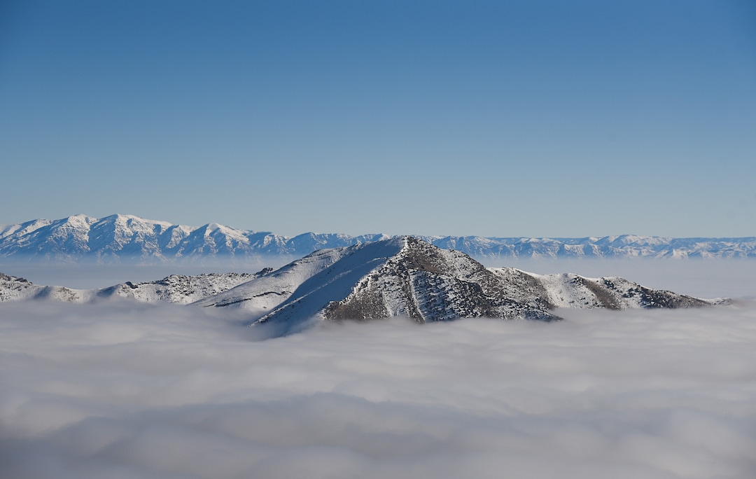 (Francisco Kjolseth  |  The Salt Lake Tribune)  The Promontory Mountains and the Wasatch Range beyond push through the deteriorating air quality under inversion conditions on Monday, Jan. 14, 2019, obscuring the ground below as pilot Jeff Greenland takes every opportunity to fly above the poor conditions. Over the radio with Salt Lake Approach before landing he can be heard saying "thanks for keeping us all safe during the shutdown," as the longest government shutdown in U.S. history drags on.
