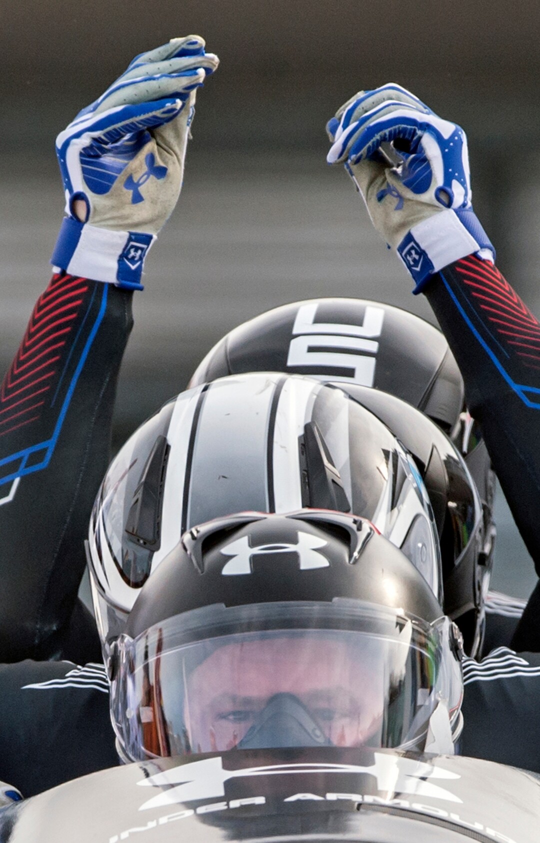 US Steven Holcomb, front, and his team,  compete in the four-man bobsled competition during the first run at the Bob and Skeleton World Championships in Winterberg, Germany, Saturday, March 7, 2015. (AP Photo/Jens Meyer)