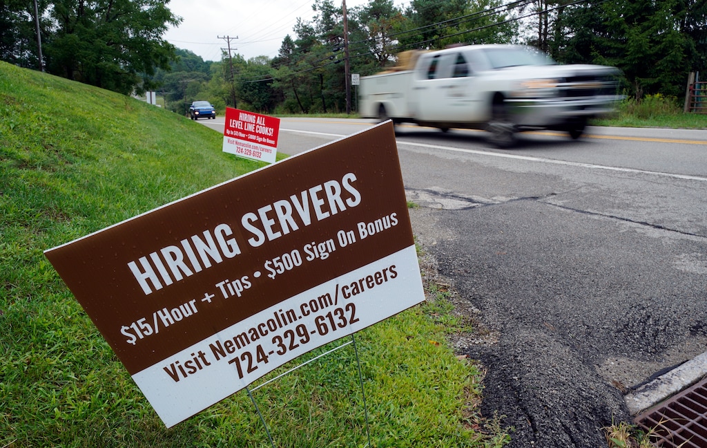 (Gene J. Puskar | AP file photo)

In this Sept. 2, 2020, photo help wanted signs for servers and cooks at Nemacolin Woodlands Resort and Spa are displayed along route 40 at the entrance to the resort in Farmington, Pennsylvania.