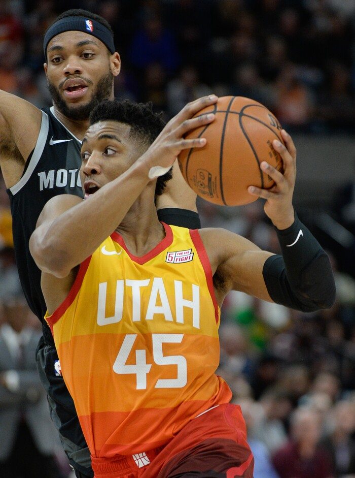(Francisco Kjolseth  |  The Salt Lake Tribune)  Utah Jazz guard Donovan Mitchell (45) maneuvers around the Pistons defense in the first half of their NBA game at Vivint Smart Home Arena Monday, Jan. 14, 2019, in Salt Lake City.