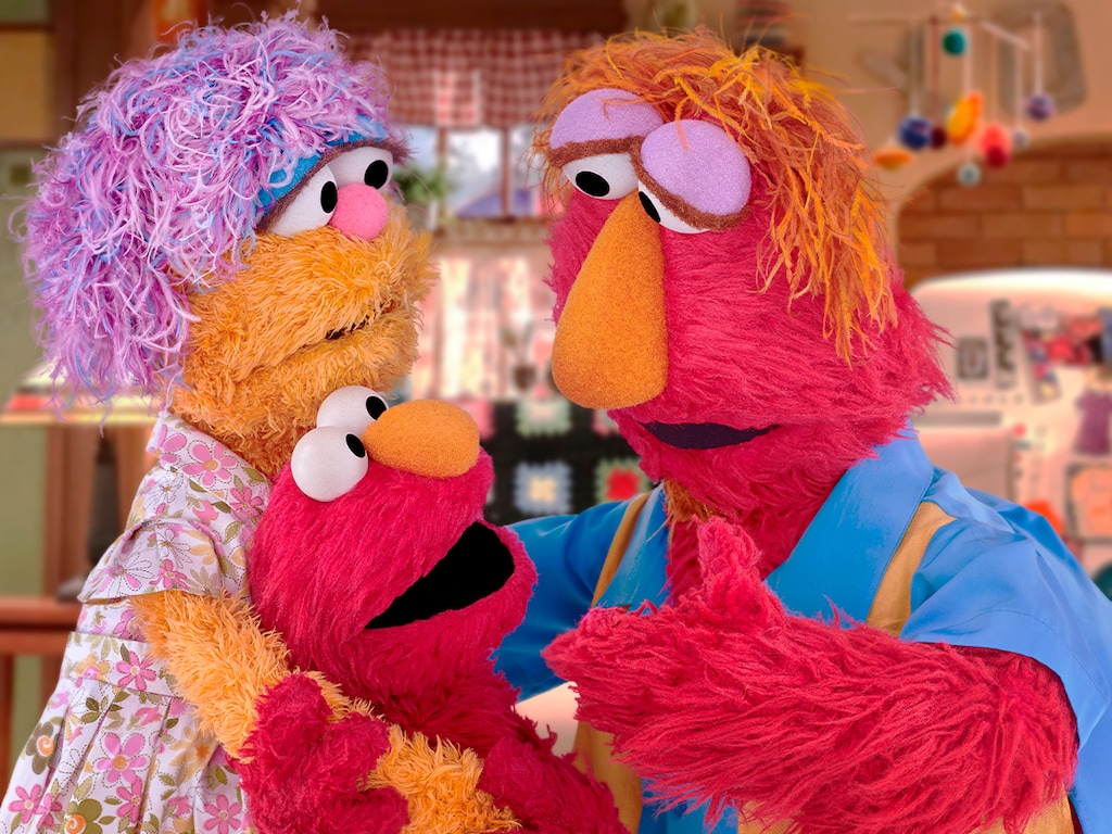 In this undated photo, Elmo is with his family (Sesame Workshop via AP)