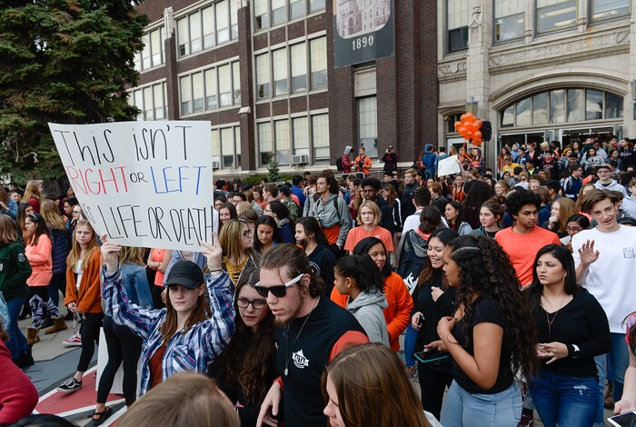 (Francisco Kjolseth  |  The Salt Lake Tribune)  West High School students walk out of classes in Salt Lake, during a student walkout on Wed. March 14, 2018. Students in Utah and around the country planned the large-scale coordinated demonstration to protest gun violence and memorialize victims of last month's mass shooting at Marjory Stoneman Douglas High School in Parkland, Fla.