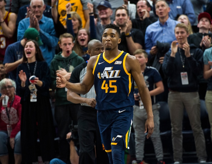 (Rick Egan  |  The Salt Lake Tribune)   Jazz fans celebrate as Donovan Mitchell (45) extends the lead for the Jazz, with a dunk late in the 4th quarter, in NBA action Utah Jazz vs Cleveland Cavaliers, in Salt Lake City,  Saturday, December 30, 2017.


