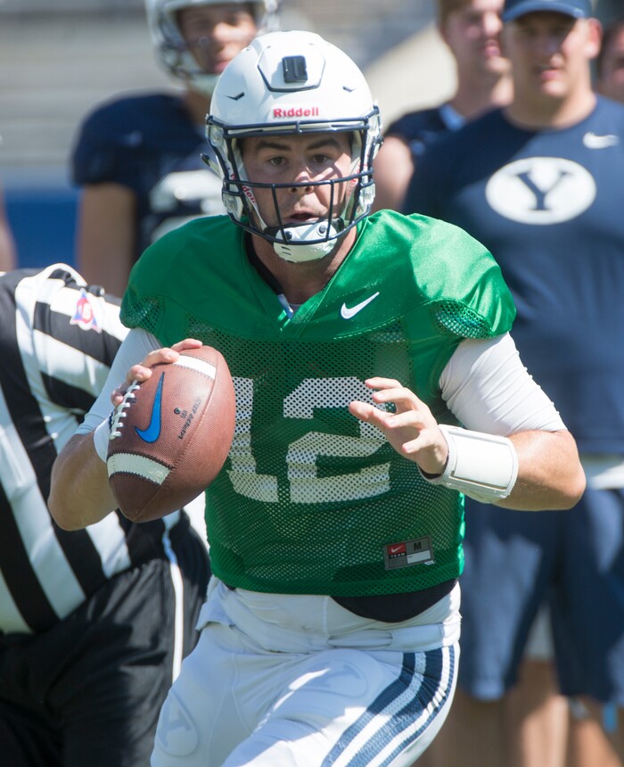 (Rick Egan  |  The Salt Lake Tribune) BYU quarterback, Tanner Mangum (12) runs the offense, during the BYU Cougars public scrimmage at Lavell Edwards Stadium, Thursday, August 17, 2017.