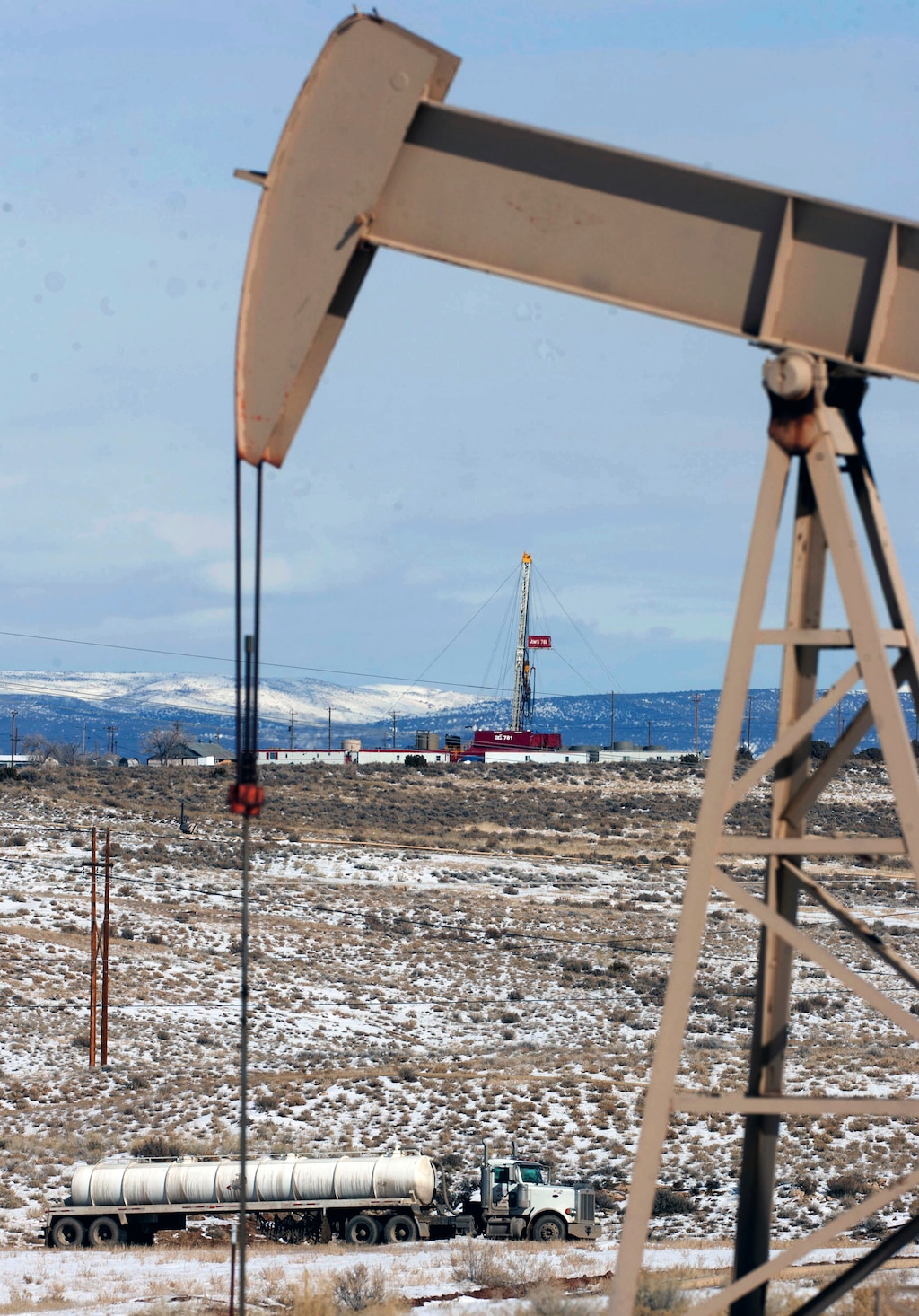 (Trent Nelson | Tribune file photo) This Feb. 21, 2012 photo, shows equipment in the oil fields of the Uintah Basin, southeast of Vernal. The Trump administration has started giving energy companies temporary breaks on royalties they must pay for oil and gas extracted from federal lands because of the coronavirus pandemic, government data shows. Royalty rate cuts so far have been authorized for at least 76 energy leases in Utah.