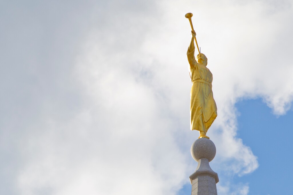 (AP Photo/Michael Sisak) The Angel Moroni trumpets atop the Mormon temple in Philadelphia.