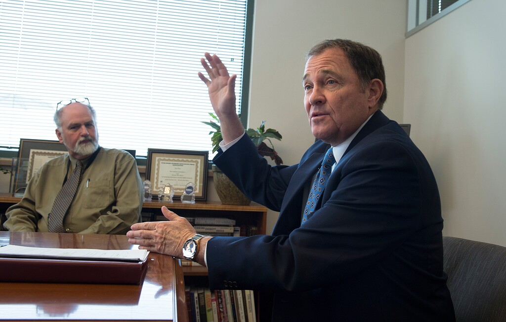 (Scott Sommerdorf   |  The Salt Lake Tribune)   
OK. Let's try this again.
Utah Governor Gary Herbert (right): How does a philosophy major order a hot dog?
Me (left): Make me one with everything.