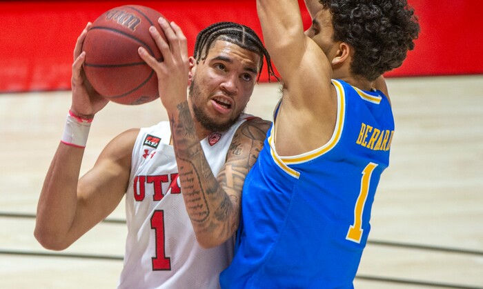 (Rick Egan | The Salt Lake Tribune) Utah Utes forward Timmy Allen (1)  looks for a shot as UCLA Bruins guard Jules Bernard (1) defends, in PAC-12 basketball action at the Jon M. Huntsman Center, on Thursday, Feb. 25, 2021.