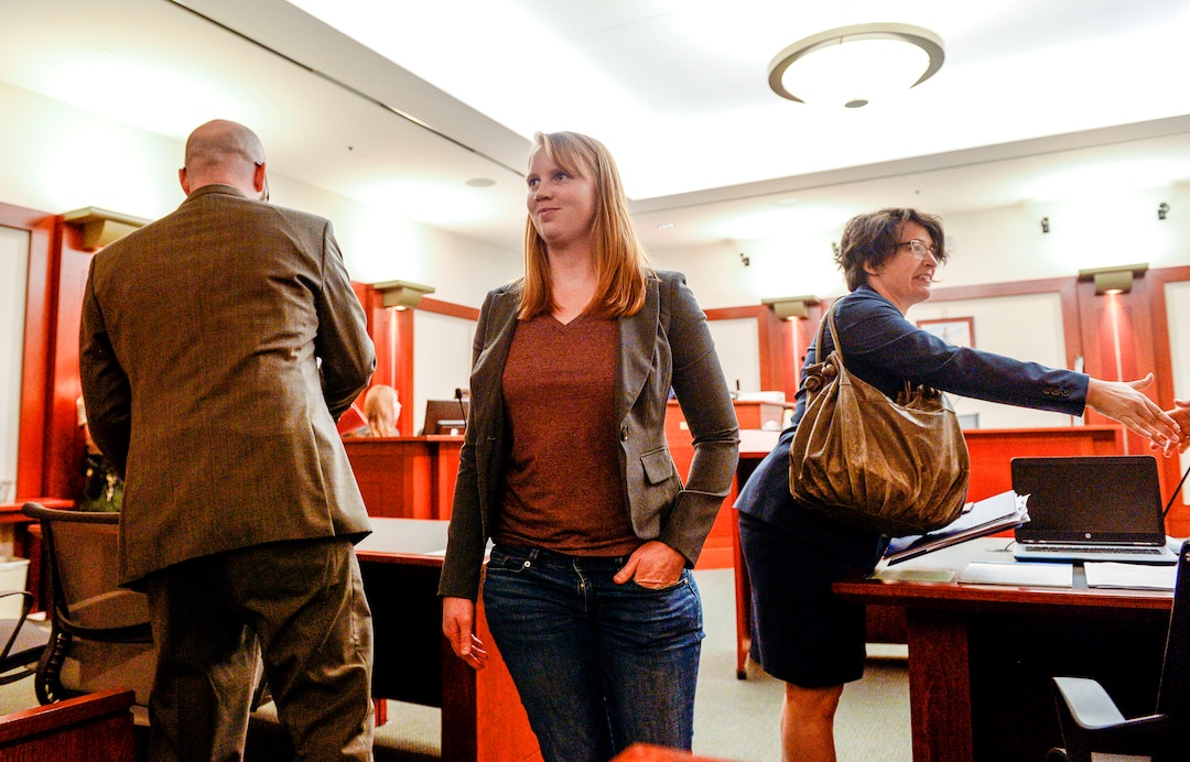 (Leah Hogsten  |  The Salt Lake Tribune)   Tilli Buchanan smiles as she leaves Judge Kara Pettit's Third District Courtroom, Nov. 19, 2019. Her attorneys Leah Farrell with the AmericanÊCivil Liberties UnionÊof Utah and Randy Richards argued on her behalf that UtahÕs lewdness statute is unconstitutional because it discriminates against women. Buchanan is facing charges of lewdness involving a child after police say she took off her top while cleaning out the garage and her stepchildren saw her breasts. Judge Pettit is expected to rule in two months.