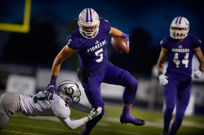 (Scott Sommerdorf   |  The Salt Lake Tribune)   Lehi TE Dallin Holker runs after a catch during first half play. Lehi led Olympus 26-0 late in the second half, Friday, September 22, 2017.