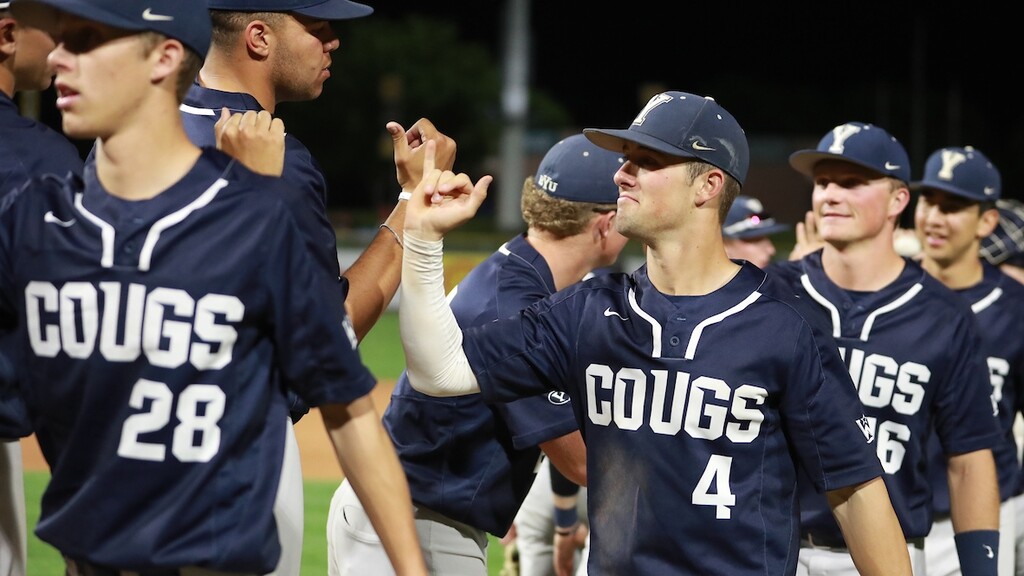 BYU shortstop Jackson Cluff (No. 4) could be selected in the Major League Baseball draft, which begins Monday and runs through Wednesday. A sophomore, Cluff celebrates with his teammates after defeating Utah on May 14. Photo courtesy of BYU photo.