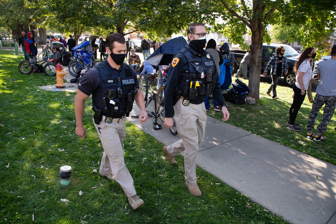 (Francisco Kjolseth  |  The Salt Lake Tribune) Police back up the Salt Lake County Health Department as they force a clean up of homeless camps set up near Taufer Park in Salt Lake City on Thursday, Sept. 10, 2020.