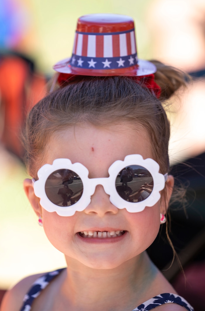 (Rick Egan | The Salt Lake Tribune)  Roșie Stephens, 4,watches the Cherry Days Fourth of July celebration, in North Ogden, on Monday, July 4, 2022.