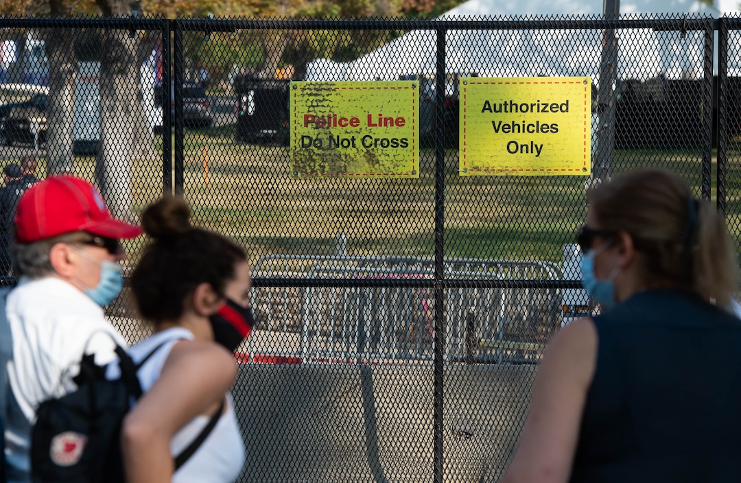 (Francisco Kjolseth  |  The Salt Lake Tribune) Supporters of President Donald Trump rally outside of Kingsbury Hall on the University of Utah campus in Salt Lake City on Wednesday, Oct. 7, 2020, before the vice presidential debate.