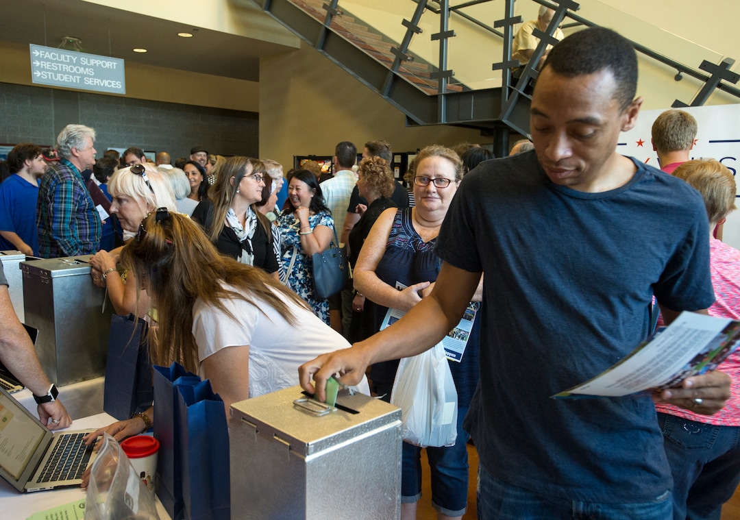 (Rick Egan  |  The Salt Lake Tribune)  Voters cast their ballots Saturday, Aug. 12, 2017, for the Salt Lake County sheriff.