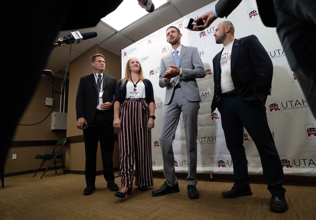 (Francisco Kjolseth | The Salt Lake Tribune) New young leadership takes its place for the Utah GOP as Vice-Chair Jordan Hess, Secretary Olivia Dawn Horlacher, Party Chair Carson Jorgensen and Treasurer Mike Bird, from left, are interviewed by the media following their win during the Utah Republican Party’s 2021 Organizing Convention at the Maverik Center in West Valley City on Saturday, May 1, 2021.