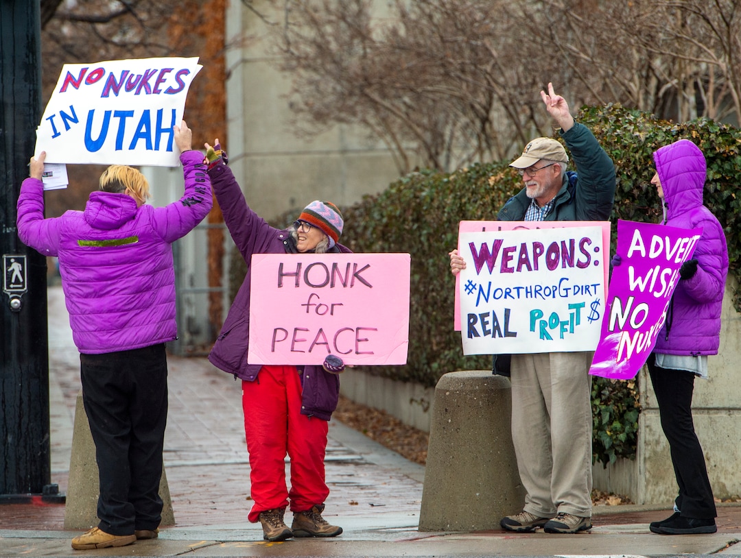 (Rick Egan  |  The Salt Lake Tribune)   
Marcus Collonge, Whitney Zack, Bob Brister, and Chelsea Page join a picketing party against Northrop Grumman on 400 West and 100 South, near the Clark Planetarium in Salt Lake City, Sunday, Dec. 8, 2019.