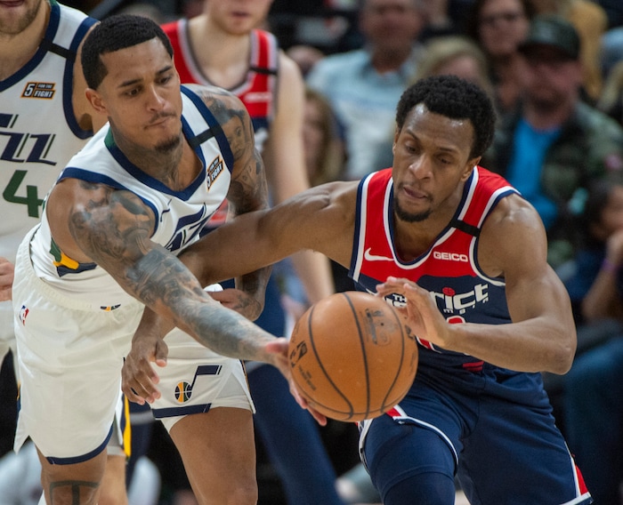 (Rick Egan  |  The Salt Lake Tribune)    Utah Jazz guard Jordan Clarkson (00) knocks the ball from Washington Wizards guard Ish Smith (14), in NBA action between the Utah Jazz and the Washington Wizards, in Salt Lake City, Friday, February 28, 2020