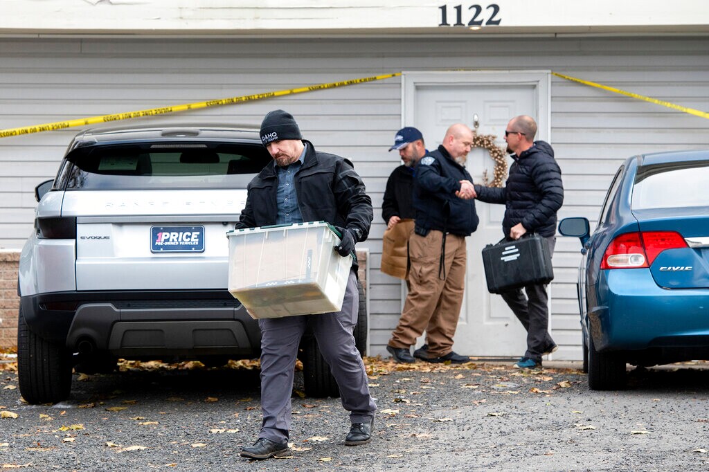 (Zach Wilkinson | The Moscow-Pullman Daily News via AP, File) Officers investigate the deaths of four University of Idaho students at an apartment complex south of campus on Nov. 14, 2022, in Moscow, Idaho. It's been nearly three weeks since four University of Idaho students were found stabbed to death in a home near campus, but there are still more questions than answers surrounding the investigation.