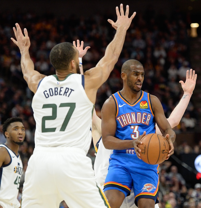 (Francisco Kjolseth  |  The Salt Lake Tribune)  Utah Jazz center Rudy Gobert (27) tries to block Oklahoma City Thunder guard Chris Paul (3) as the Utah Jazz host the Oklahoma City Thunder in their NBA basketball game at Vivint Smart Home Arena in Salt Lake City on Mon. Dec. 9, 2019.